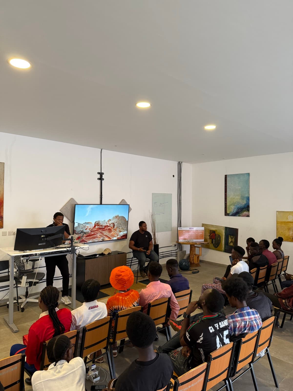 Teaching a full workshop room at Christex Foundation.