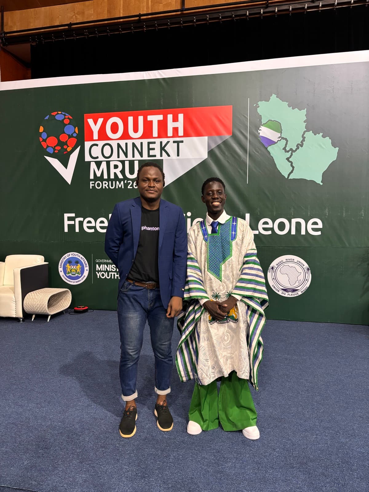 At the YouthConnekt MRU Forum backdrop with a fellow delegate.